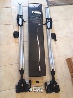 2 x Thule OutRide roof mounted bike carriers 561