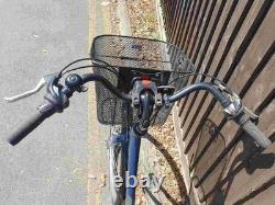 Aluminium Alloy Apollo Elyse Hybrid bike with a front basket, rear rack carrier