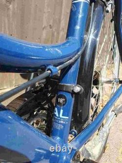 Aluminium Alloy Apollo Elyse Hybrid bike with a front basket, rear rack carrier