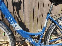 Aluminium Alloy Apollo Elyse Hybrid bike with a front basket, rear rack carrier