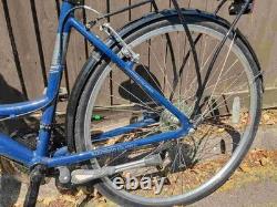 Aluminium Alloy Apollo Elyse Hybrid bike with a front basket, rear rack carrier