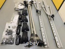 CRUZ aluminium roof bars + 2 bike carriers