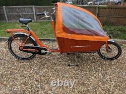 Family cargo bicycle, long wheelbase, bench seats plus baby seat carrier