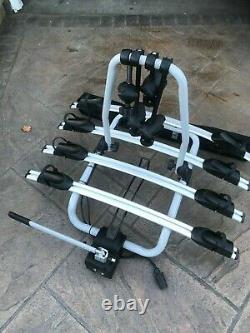 For sale 4 bike tow bar cycle carrier rack great condition with rear lights