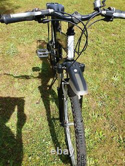 Montague X50 folding mountain bike with carrier, rear bag and carrying bag